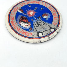 lenticular badge for the Atari international asteroids tournament