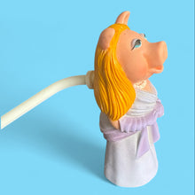 Miss Piggy from the muppets hard plastic stick puppet with white fisher price stick that goes in the back of the head 
