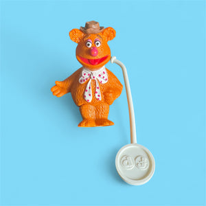 fozzie bear from the muppets hard plastic stick puppet with white fisher price stick that goes in the back of the head 
