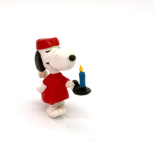 PVC Peanuts figure of SNOOPY   dressed ready for bed like Wee Willie Winkie,with a long night cap and candle   