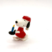 PVC Peanuts figure of SNOOPY   dressed ready for bed like Wee Willie Winkie,with a long night cap and candle   