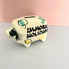 Toni Raymond Piggy Bank Immoral holidays